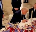 Moment Trump signs US-Iran agreement at Palace of Versailles